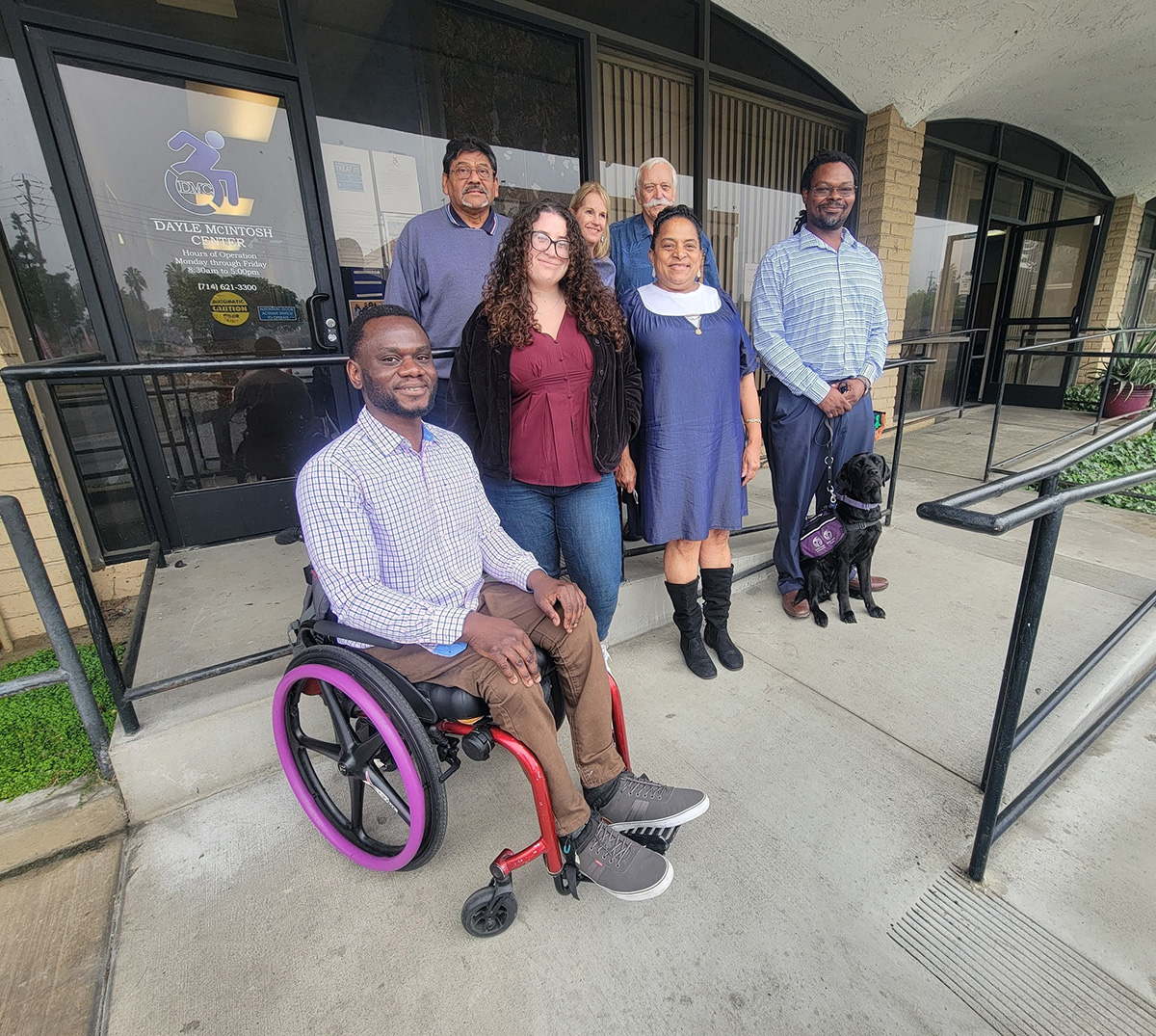 DMC Board of Directors on Ramp in December 2025 after annual meeting outside DMC. L-R: Front Row: Tolu Adedoja, Gracie Doran, Grace Yhap and Griffin Dooley. Back row: David Flores, Suzanne Alle and Tony Clement.