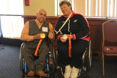 Apple2015 DMC Staff Mir with Speaker Angela M. holding her medals