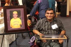 Apple2015 Ed Roberts Awardee, Bhumit holding picture of Richard D