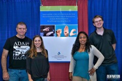 DMC-Archives-Photo-2-DMC-Deaf-Services-Team-at-Deaf-Nation-Conference-standing-at-booth