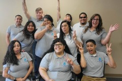 DMC-Archives-Photo-4-Team-DMC-acting-silly-gathered-as-a-group-giddy-for-Empowering-Possibilities-2023