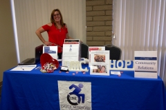 DMC Staff Lani at Community Relations Table