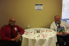 DMC Staff Mir and Bruce at Community Transistion Table