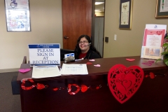 DMC Staff Nelly at reception desk