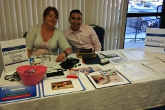 DMC Staff Rony and Jose at Independent Living and Systems Advocacy resource table