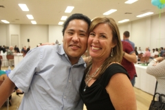 Close up of Kenny and Lani with faces together posing for pictures