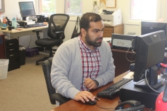 ILS Instructor, Roman working on Computer