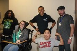 Services Picture of instructor and 4 youth consumers. One youth is flexing his muscles.