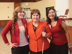 Vision loss Picture of 3 staff two of them have blindness one has cane