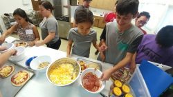 Youth Transistion group making pizza