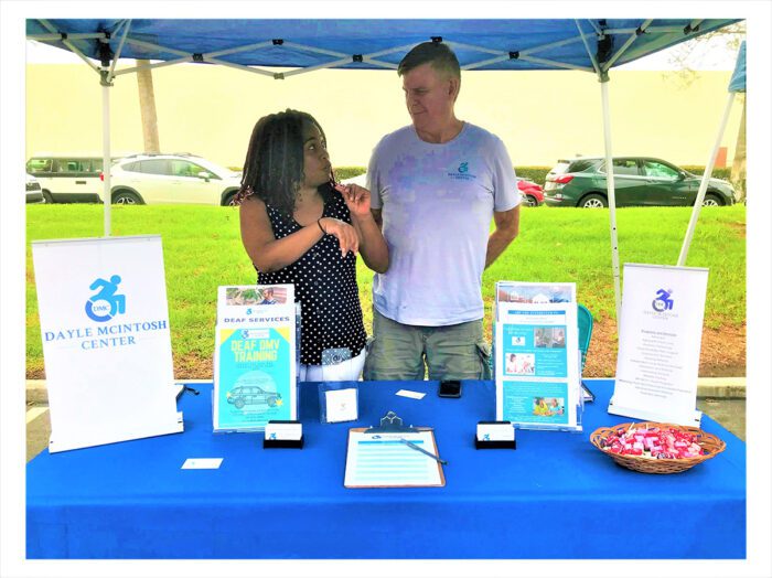 DMC’s Pamela & Jet at Deaf Awareness Riverside at DMC representation booth.  