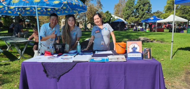 DMC works in the community all year long. Pictured, is Team DMC working at the Annual Halloween Resource Fair.