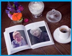 Open book with two women and a cup of coffee.