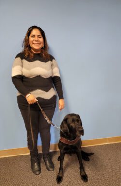 Pictured, A beautiful partnership between a person and a guide dog is one of the basic orientation techniques offered by DMC