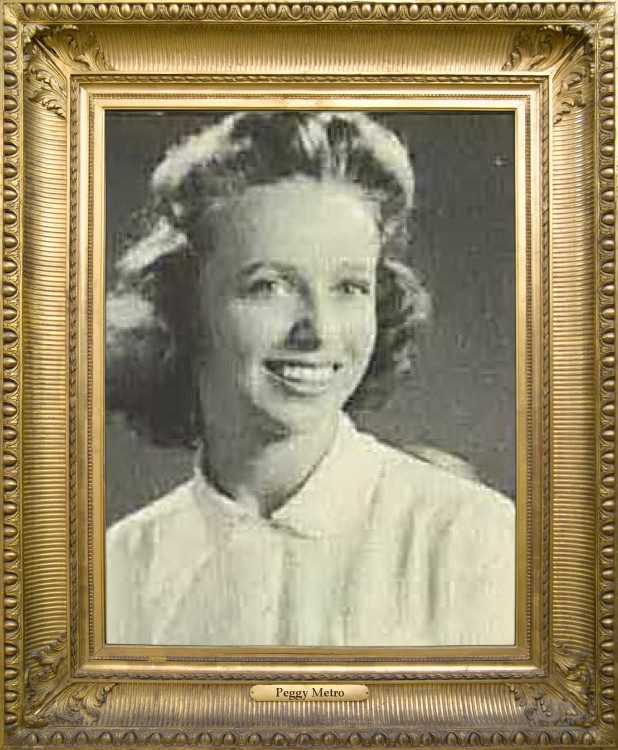 Pictured Peggy Hopkins Metro, wearing a white blouse, smiling