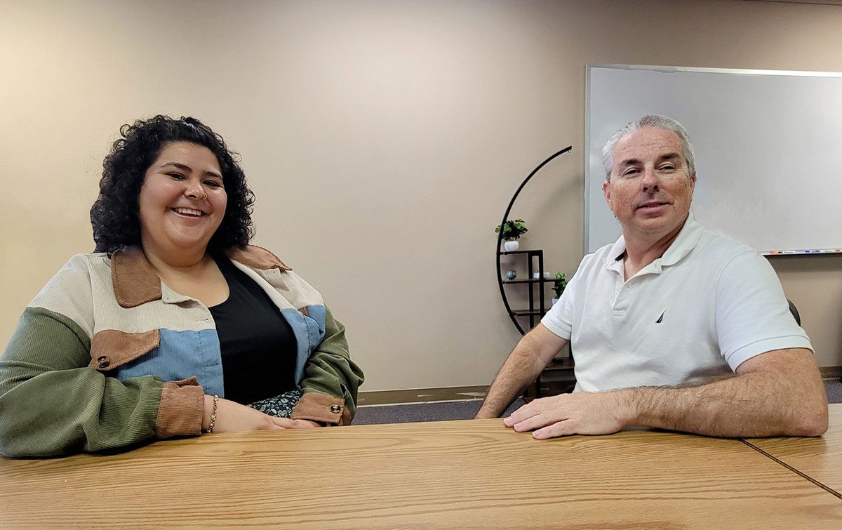 Pictured, Anita Becerra, ILS Living Instructor with Paul Brennan, Lead IL Advocate at desk in DMC