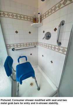Consumer shower modified with seat and two metal grab bars for entry and in-show stability