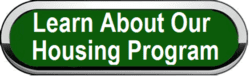 Dark green oval button with silver and black border. Learn About Our Housing Program is written in white.