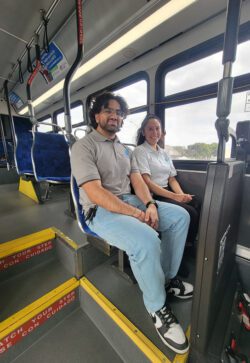 PICTURED: DMC’s MMPP Travel Trainers Babar and Sol sitting on the bus