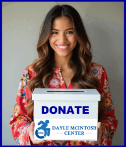 DMC’s Liza smiling holding white donation box which reads donate in blue letters with DMC logo on box.