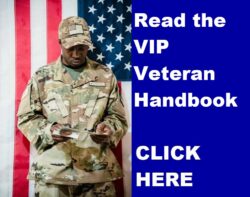 Photo of military peronnel reading a paper with the US flag behind them. To the right reads “Read the VIP Veteran Handbook CLICK HERE” in white text on blue background