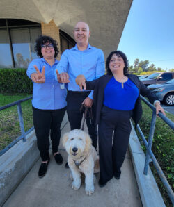 : DMC VIP Team: Michelle Ramos, Director of Care Services, Eric Rodriguez, VIP Program Advisor, Marysol Cuadrado, VIP Program Advisor and “Honey”