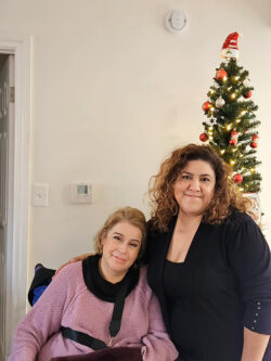 Transitions Consumer Marth with Mari in home with Xmas Tree
