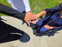 Admin Team hands "all in" this together